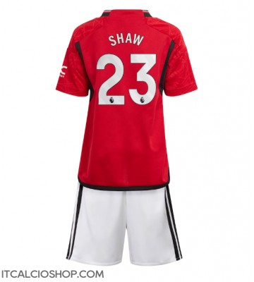 Manchester United Luke Shaw #23 Prima Maglia Bambino 2023-24 Manica Corta (+ Pantaloni corti)